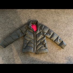 Nike down feathered coat. Comes with a hood.